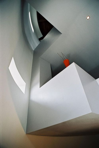 Illustration for article titled Water Tower Apartment Looks Great Inside, Misses Fiery Magical Eye on Top